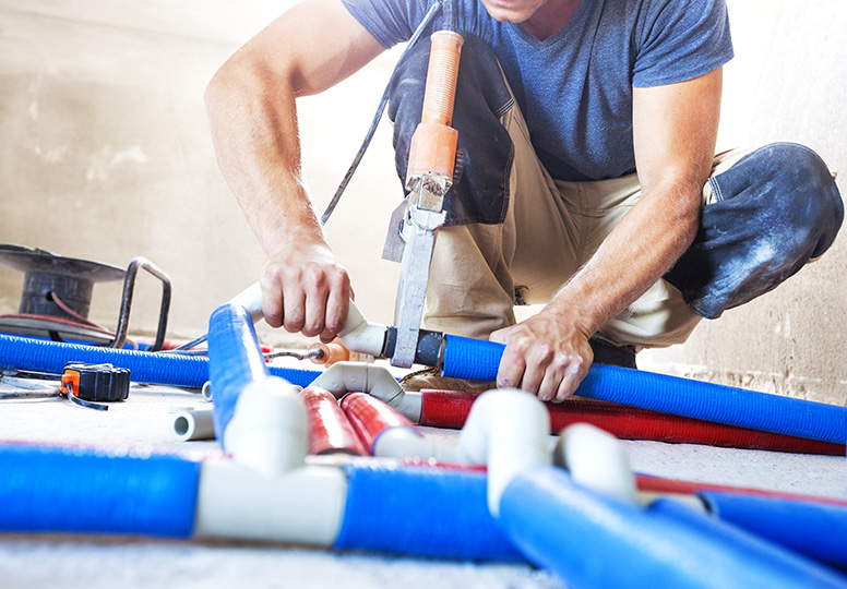plumber working - Plumbing Costs: Need to Know